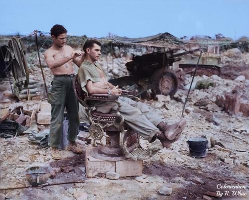 historicaltimes: Members of the 363rd Field Artillery Battalion, Pvt. Troy Dixon uses a Japanese bar