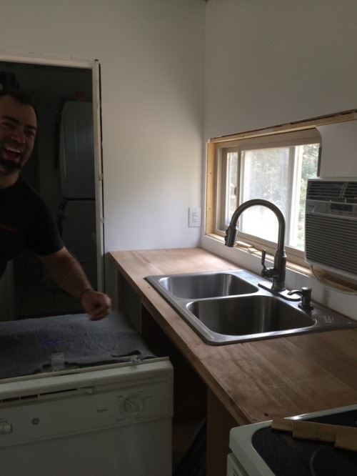 Getting the dishwasher and kitchen sink installed!! #containerhouse #shippingcontainer