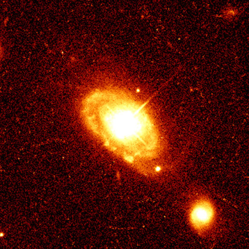 This image shows quasar PG 0052+251, which is 1.4 thousand million light-years from Earth, at the co