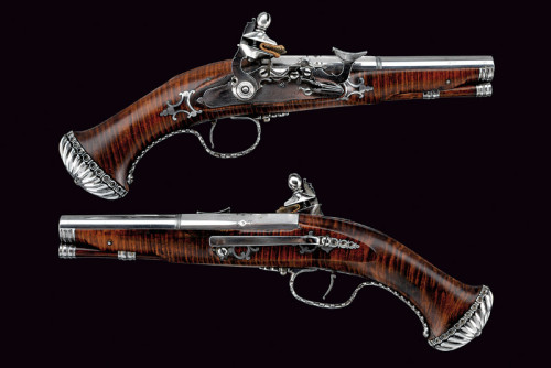 A beautiful pair of snaphuance pistols originating from Tuscany, late 17th century.Sold at Auction: 