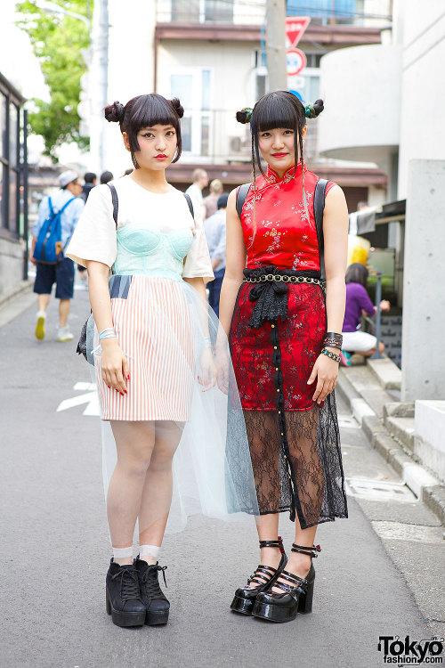 Mai &amp; Nami - both 18-year-old students - on the street in Harajuku wearing twin bun hairstyl
