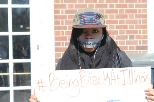 yo-tori:  kadyroxzwhat:  boobsanddimples:  l20music:  beingblackatillinois:  Several University of Illinois Students gathered on the quad for a silent protest against the oppressive remarks made to Black students.  Love this. I wanna see more of these