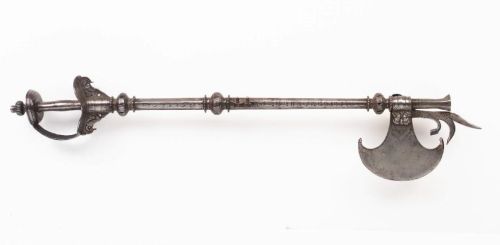 art-of-swords:  Rare combined Axe and Matchlock Pistol Dated: 17th century Culture: South Indian Measurements: 86.2cm (34 inches) Provenance: Robin Wigington, The Arms & Armour Gallery, Poet’s Arbour Formed with crescentic blade with reinforced