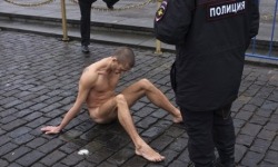  Artist Pyotr Pavlensky nails testicles to floor in protest  &ldquo;A naked artist, looking at his balls nailed to the Kremlin pavement, is a metaphor for the apathy, political indifference, and fatalism of contemporary Russian society.&rdquo;