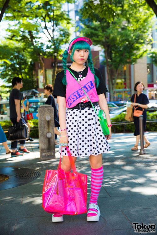 18-year-old Japanese fashion student Giovanni on the street in Harajuku wearing a colorful look that