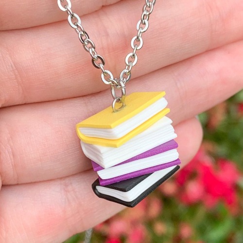 justlgbtthings:sosuperawesome:Pride Book Stack Jewelry and KeychainsShiny Stuff Creations on Etsy i