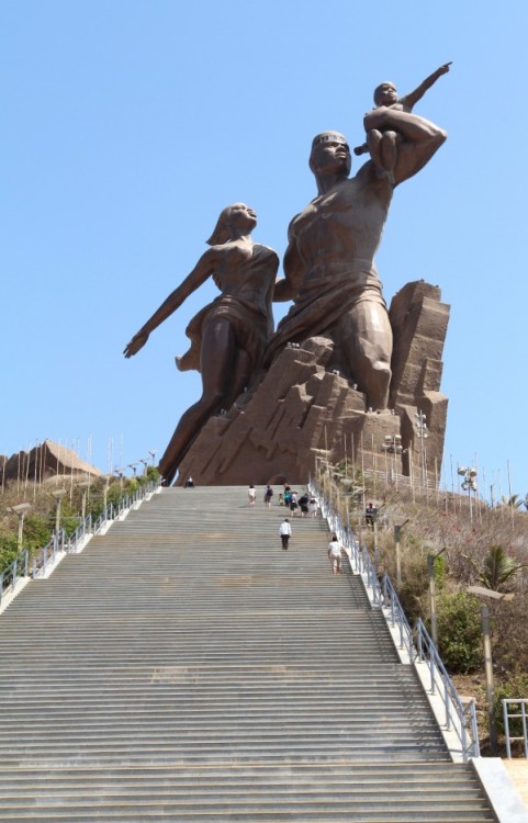 daretobeblack:  gravitatingwhispers:  phiife:  therealview:  “African Renaissance”, located near the airport in Dakar (Senegal) stands 49m tall on the top of a 100m high hill. The tallest statue in the world outside of Eurasia.  jesus christ knows