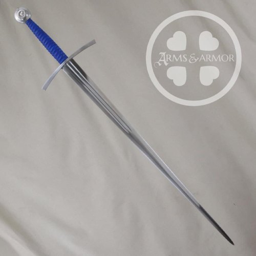Sword Pics for Shut Ins- a custom longsword with a double fullered blade, blue leather grip and a wh