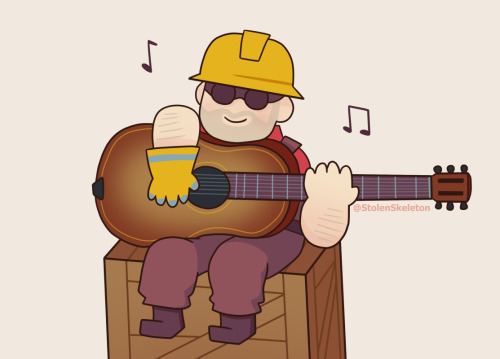 Engy playing his guitar