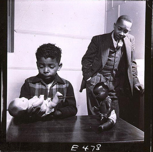 returnoftheblackking:  cavetocanvas:  Gordon Parks, Dr. Kenneth B. Clark conducting the Doll Test, Harlem, New York, 1947 In the “doll test,” psychologists Kenneth and Mamie Clark used four plastic, diaper-clad dolls, identical except for color.