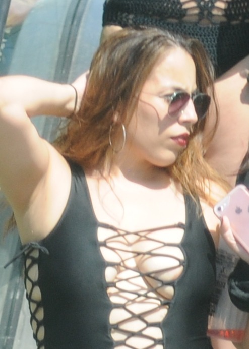 Yep, her areola is peeking out.