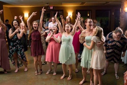 Oh look, it’s me in maroon at the bouquet toss 