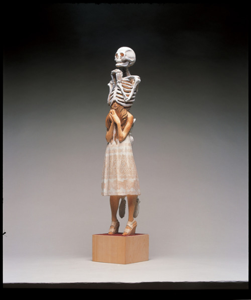 sixpenceee:  The bizarre art of Yoshitoshi Kanemaki. He chisels these life-sized figurative sculptures out of giant pieces of camphor wood, a kind of evergreen. The strange pieces frequently involve two or more characters merged into a single form, which