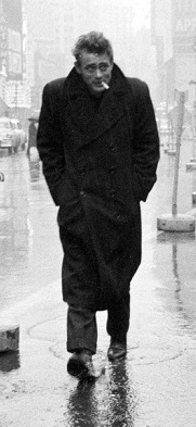 pierppasolini:  James Dean walking through the rainy streets of New York City, 1955.photographed