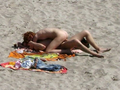 nude-beach-sex: Nudists couple fucking hot nude beach sex voyeur photo