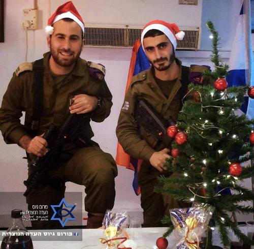 girlactionfigure:  Israeli Christian soldiers serving in the IDF and taking part in protecting the State of Israel and the holy land, would like to wish all of you a Merry Christmas and a happy new year! — with Arnaz Nazareth.  Father Gabriel Naddaf’s
