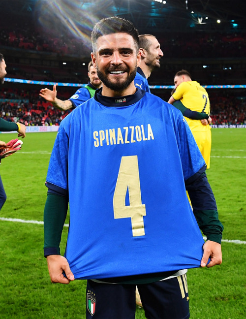 Lorenzo Insigne celebrates wearing a shirt of team mate Leonardo Spinazzola after the match vs. Spai