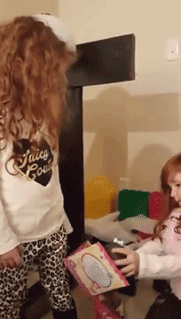 Cruel Parents Give White twin girls black baby dolls to film their reaction at Xmas