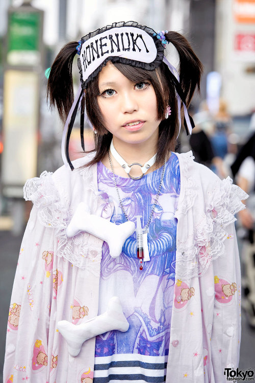 16-year-old Pinkyuamomota on the street in Harajuku wearing a Milklim robe (with plush bones) over a