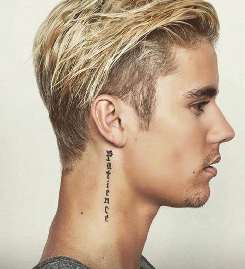 Celebritattoo  Justin Bieber  Patience tattoo behind Justin