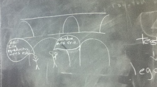 something my friends and i in Roman law doodled today on the chalkboard! it really confused the pre-