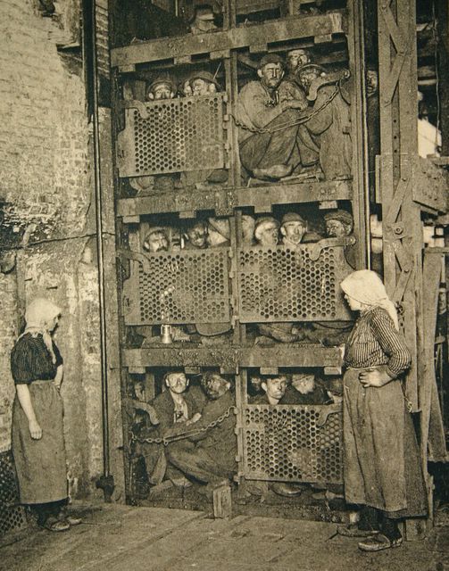 sixpenceee:  Belgium coal miners crammed into a coal mine elevator, coming up after