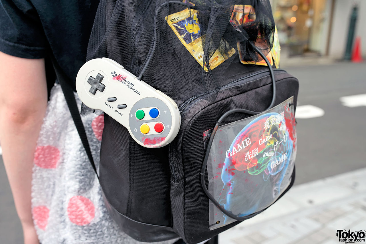 tokyo-fashion:  17-year-old Nontan on the street in Harajuku with a game-themed look