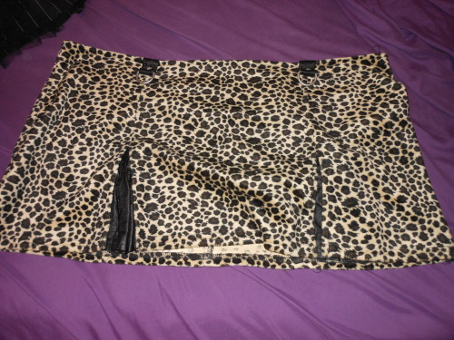 dykevanian:Selling this leopard mini skirt w/ faux leather trim by Lip Service, $13 + $5 shipping, M