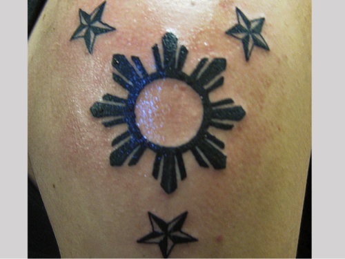 Small Nautical Stars and Sun Filipino Tattoo