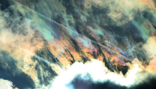 nubbsgalore:  photos of cloud iridescence — caused as light diffracts through tiny ice crystals or water droplets of uniform size, usually in lenticular clouds — by rolf kohl. see also: circumhorizontal arcs, asperatus clouds, mammatus clouds, polar