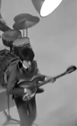 harrisonstories:  “George was wonderful on the guitar. His little legs would kick