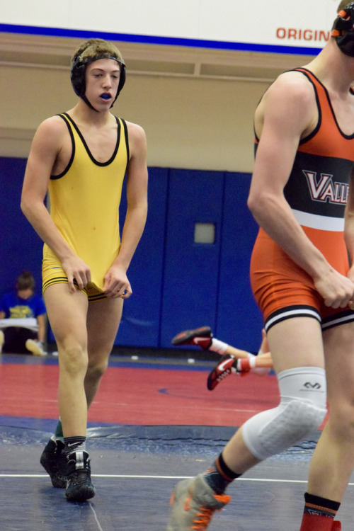 wrestleman199:no shame in what you got there  orange singlet 