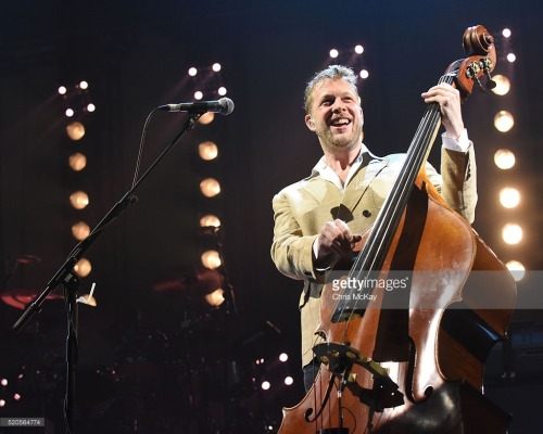 Ted Dwane of Mumford & Sons performs at the Infinite Energy Arena in Duluth, Georgia on April 11