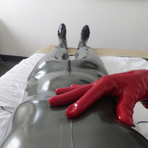 apaaps:  Still a little wet on the inside. ( Sweating away in latex )STR catsuit Latex Nemesis hood TMRA. gloves.