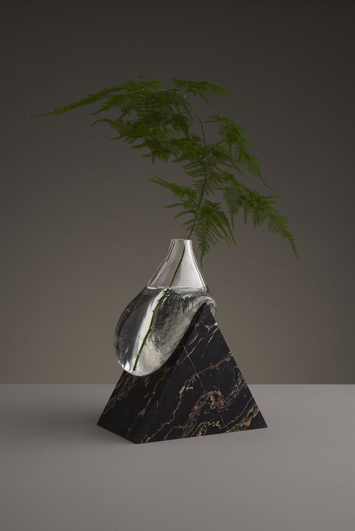 talkingtrashcan:taktophoto:Misshapen Glass Vases by Studio E.O Appear to Melt Atop Angular Stone Pla