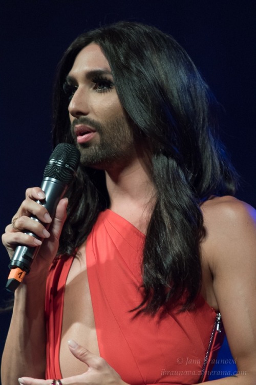 August 10, 2015Conchita at the opening concert of the 5th Prague Pride in a red silk jumpsuit from C