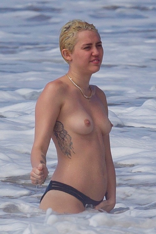 : Miley Cyrus - topless in Hawaii. (01/21/15)