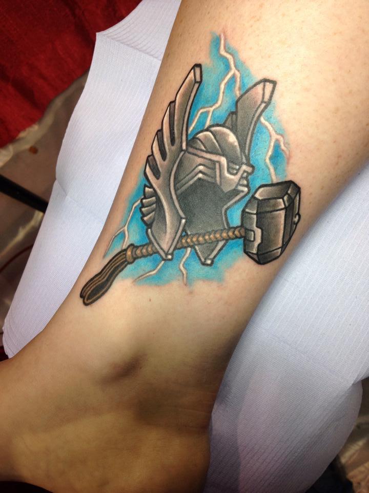 fuckyeahtattoos:  My Thor helmet &amp; Mjolnir tattoo done at Megacon in Orlando,