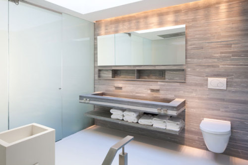 {An exhibitionist’s bathroom!} A 2,400-square-foot triplex penthouse residence is a world apar