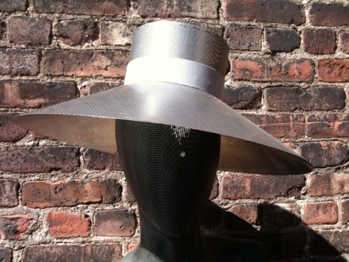 Metal Millinery - Perforated Stainless Steel Hat by Sullivan Walsh, of Walsh Metalworks, located in 