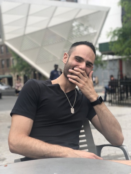 tj-593:  My friend took these photos of me cracking up in real time as he was making a joke about hot leather daddies as a couple of leather daddies passed by our table in the park. Also, look how horrible of a job portrait mode did here.