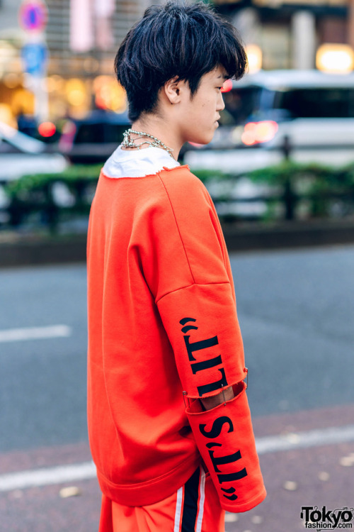 16-year-old Japanese student New Kappa on the street in Harajuku wearing a remake jacket with cutout