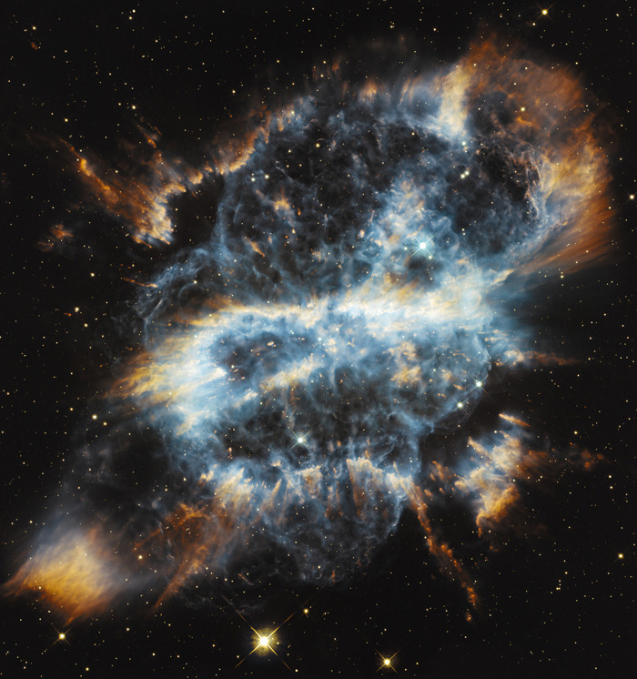 Photo of the day: ‘Cosmic holiday ornament’ depicts dying star 3,000 light years away    A planetary nebula resembling a festive bauble and ribbon is captured by astronomers using the Hubble Space Telescope.