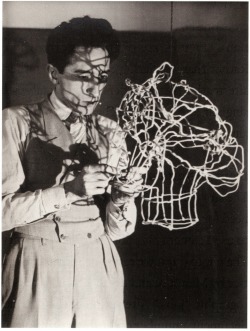 rudygodinez: Man Ray, Jean Cocteau Sculpting his own head in wire, (1926)  Gelatin Silver Print 