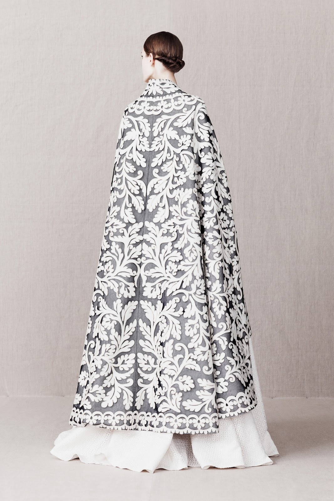 gothiccharmschool:  The black &amp; white coat! Lots of interesting, pretty designs