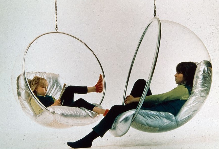 saintlaurentgirl:Eero Aarnio’s daughters Rea and Marja-Leena in the Bubble Chair