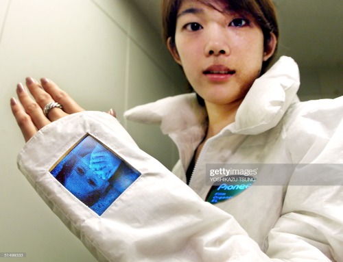 lame-beauty-item:Japanese electronics maker Pioneer employee Kayoko Tanaka wears a jacket which has 