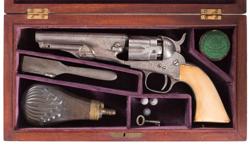 Cased and engraved Colt Model 1862 Police revolver with checkered ivory grips.