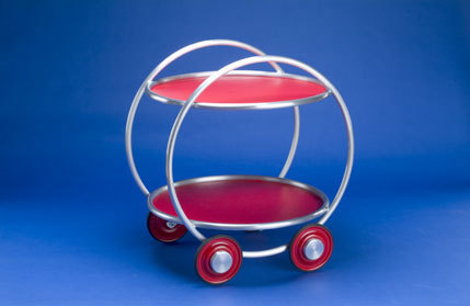 Russel Wright, Roly Poly Cart, 1936.Re-editon HKdesigns. Aluminium serviceware featured in 1930s adv
