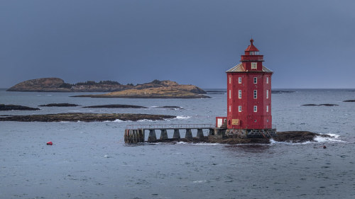 before the storm by nhoremans1969 Kjeungskjær, famous Norway lighthouse, shot from a moving ship wit